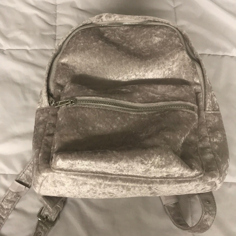 brand new silver velvet backpack